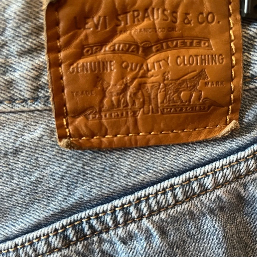 Levi's Premium High Rise Loose Tapered Distressed Denim Jeans
